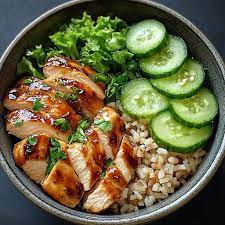 Chicken Breast with Black Pepper Sauce + Brown Rice + Cucumber Salad + Orange